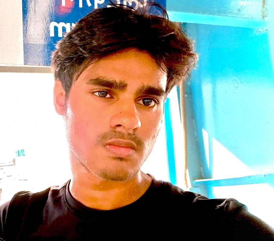 Dramatic portrait of a man in a black puffer coat and scarf, holding a clear umbrella in heavy snow. Cinematic lighting, photorealistic, hig...