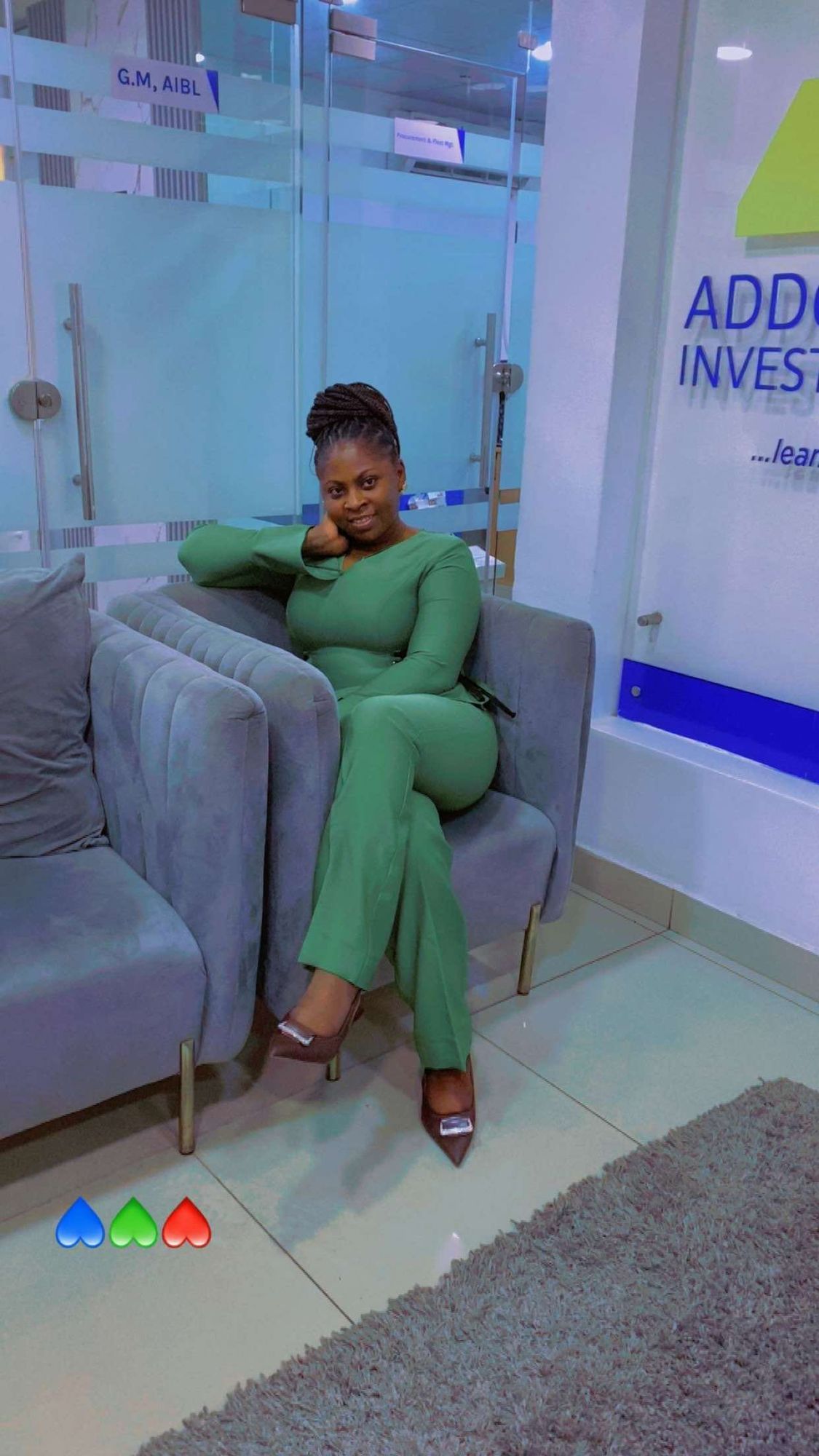 Myself in a two piece loose outfit, feeling carefree and happy. With a fine wig and a hat to match the outfit. I am seated in style