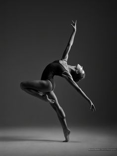 A beautiful dancer dancing in the forest under the light of the harvest moon.