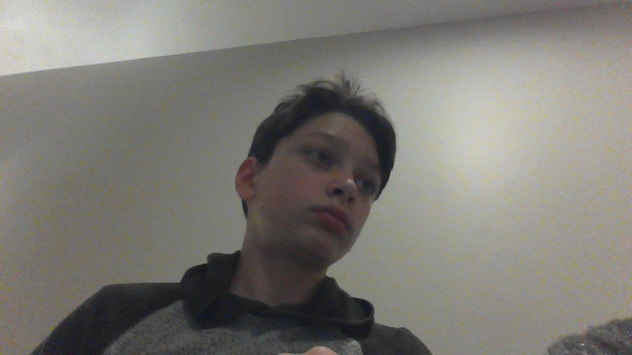 a teenage boy with flowy white hair in anime style