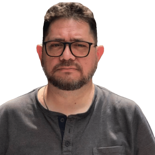 man with native american descendency dressed in star trek TNG Uniform, stares at camera makes an evil grin cyberpunk 2099 blade runner 2049...