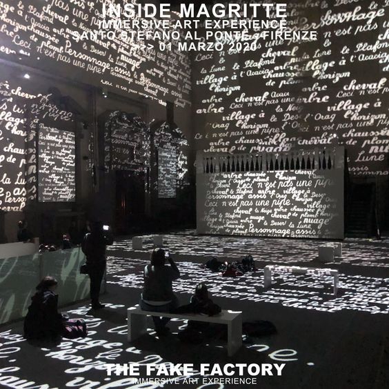 We are in a historical building where a very exciting art performance is taking place. The background is dark and spooky. There is a female...