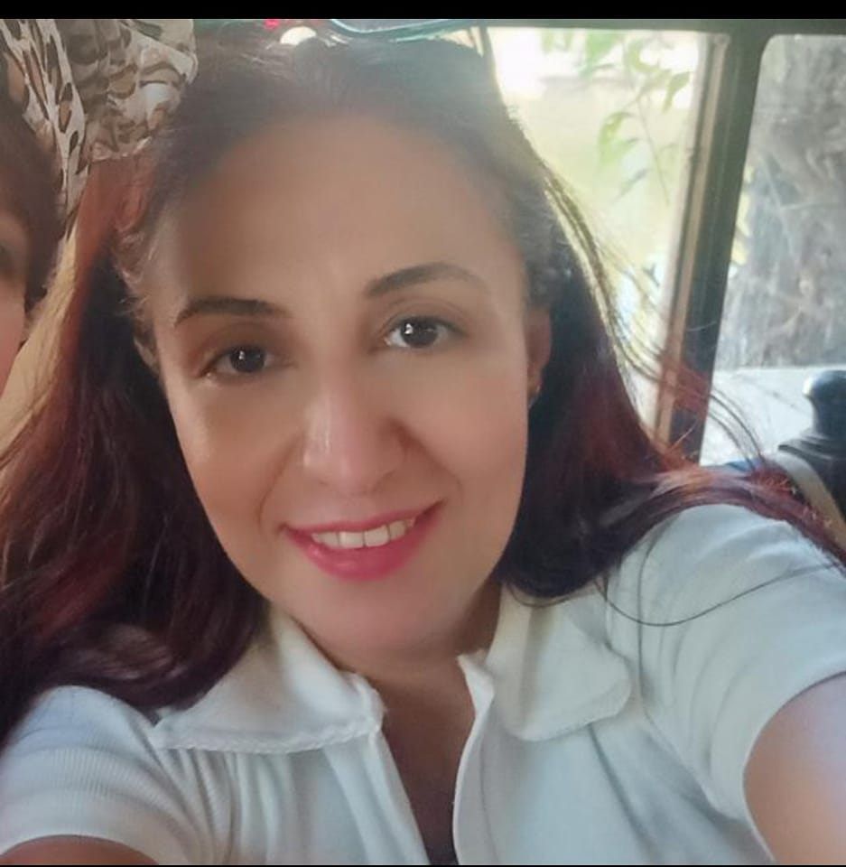 close up charming girl, 25 years old, in cyan shirt, smooth hair, black eyes, light smile, by the style of Luis Royo, head and shoulders por...