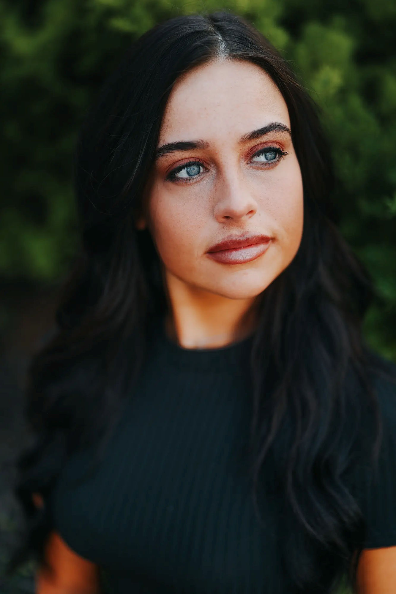 Moody and expressive portrait of a brooding female figure in the intense, Expressionist style of Egon Schiele