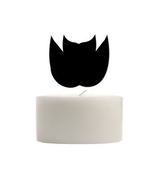 A purple flame over a short and transparent candle.