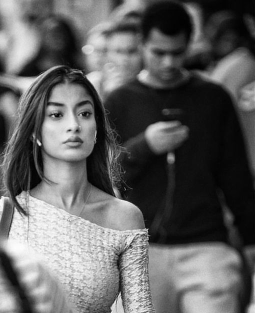 3D image, beautiful Latin woman in crowd