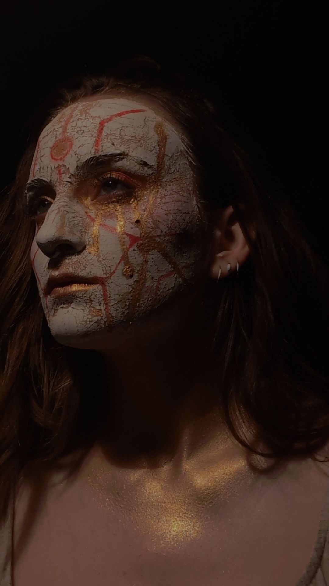 Human with ciborg feature, steam punk vibe