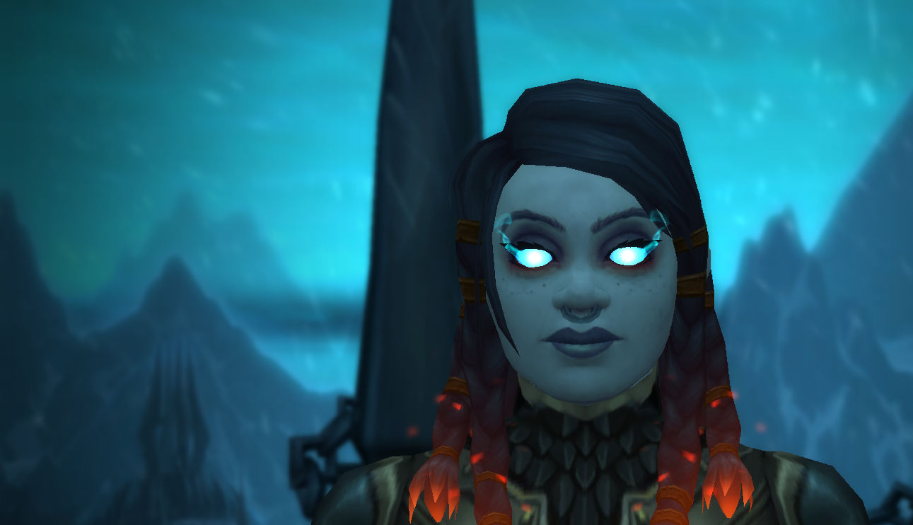 Medium shot of a beautiful man wearing colorful Día de los Muertos face paint.