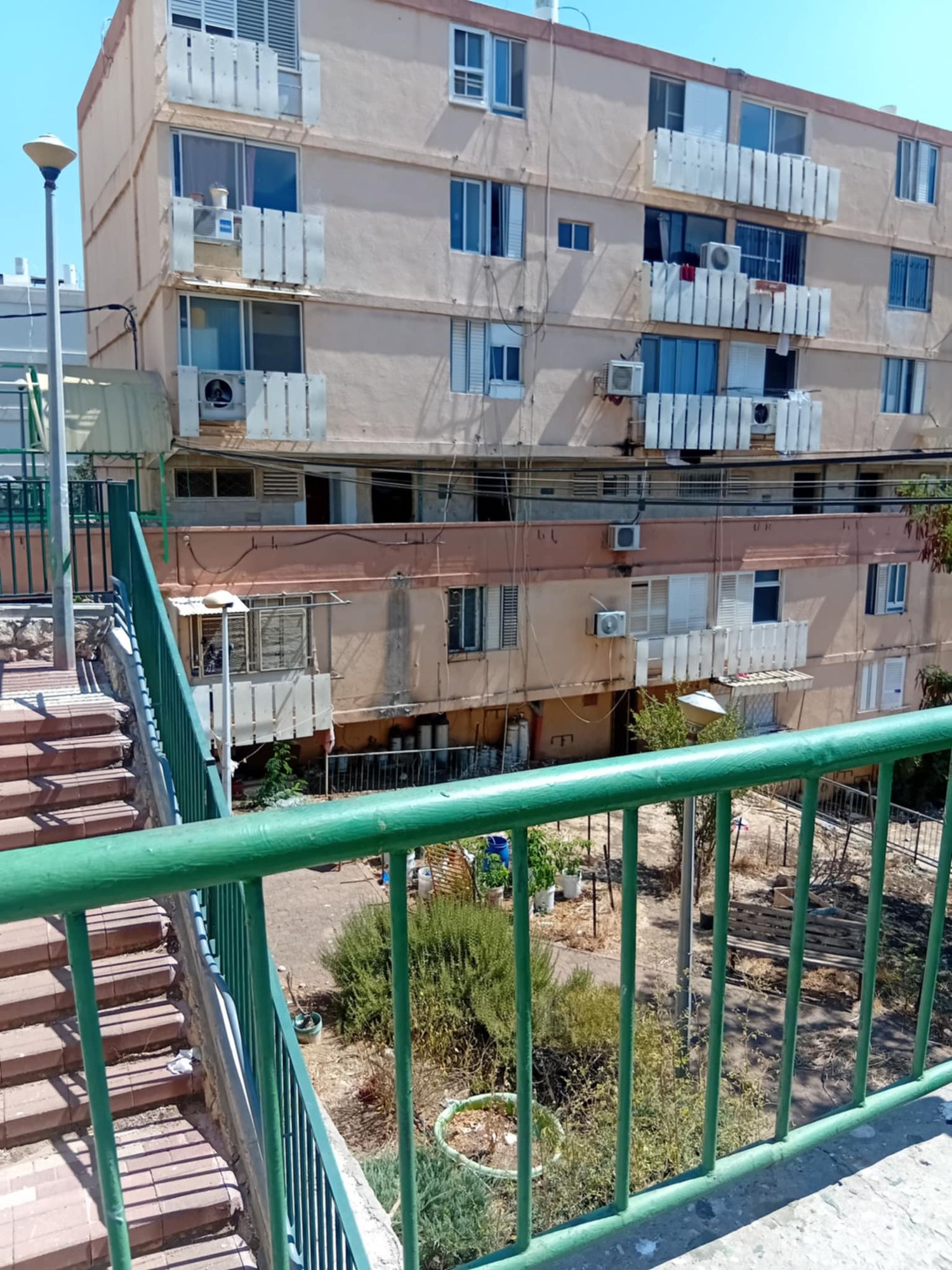 A massive transit complex station in the middle of the mountains.