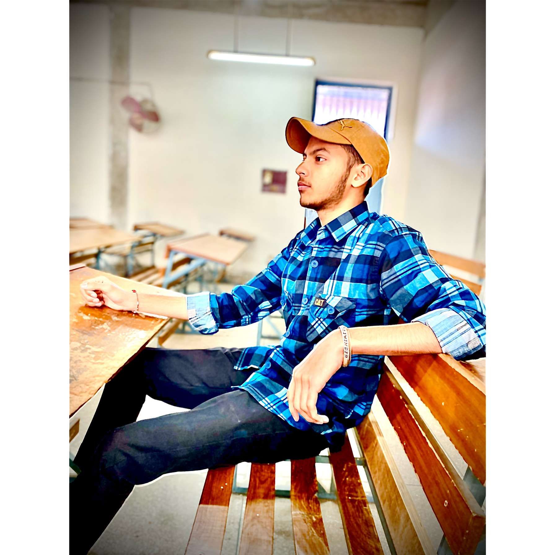 a boy sitting on the bench