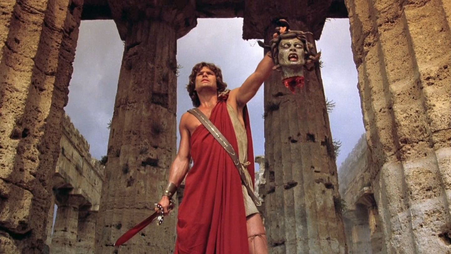 Perseus, with his sword in one hand, and the head of Medusa in the other.