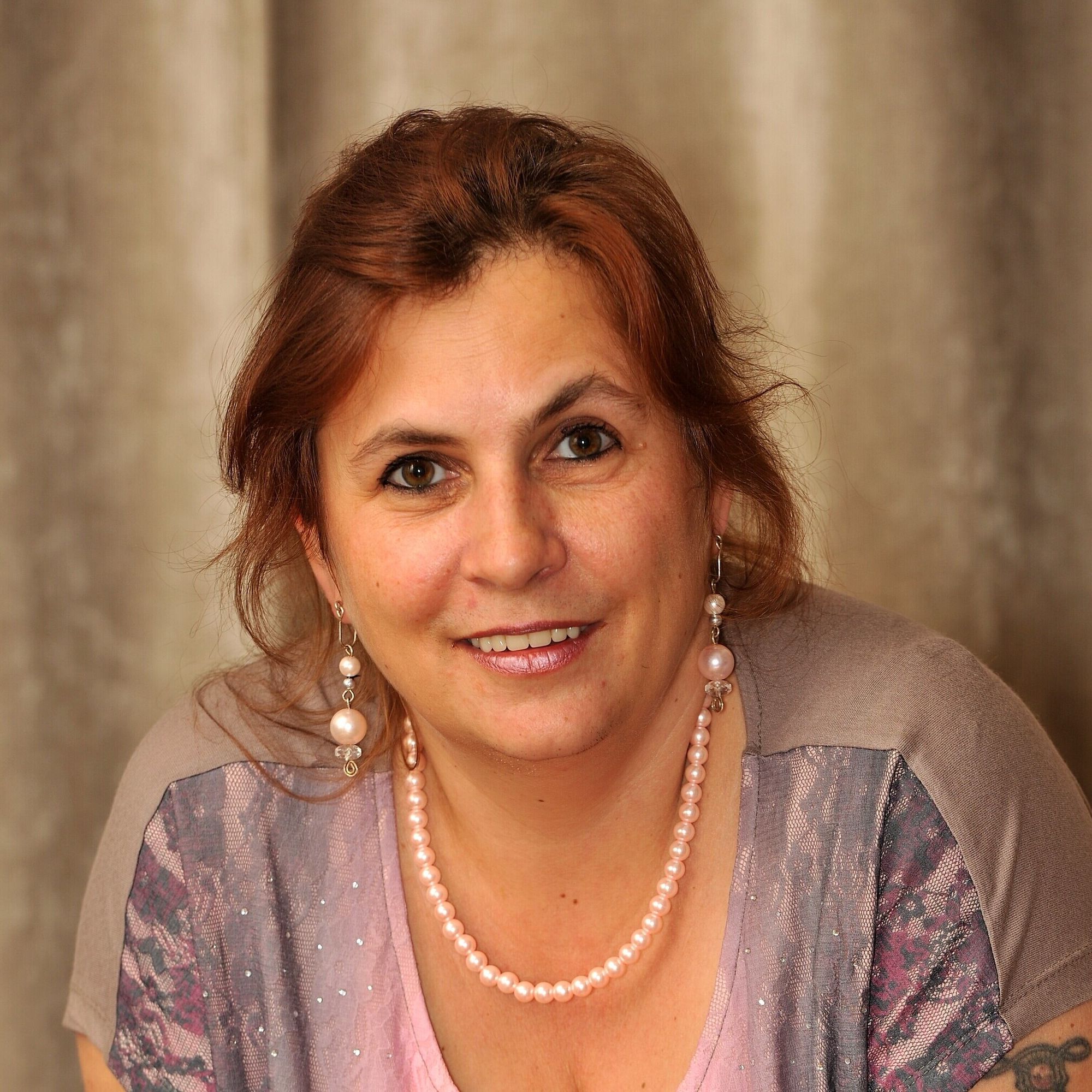 mage is a digital artwork featuring a woman in a regal, ornate style. She stands centered against a richly patterned background with geometr...