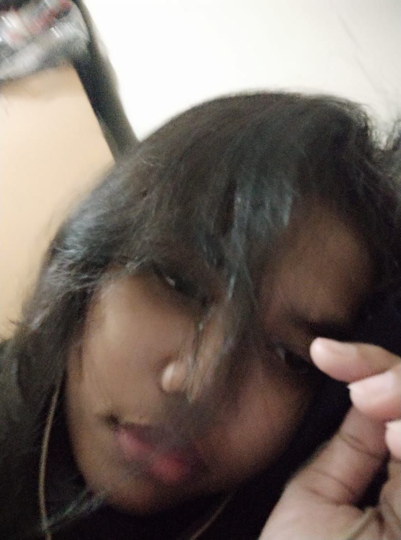 An Asian girl wearing a plain swimsuit without a floral pattern. Her face and body are facing the camera. She's on a beach in Bali (Indonesi... - Start Image 2