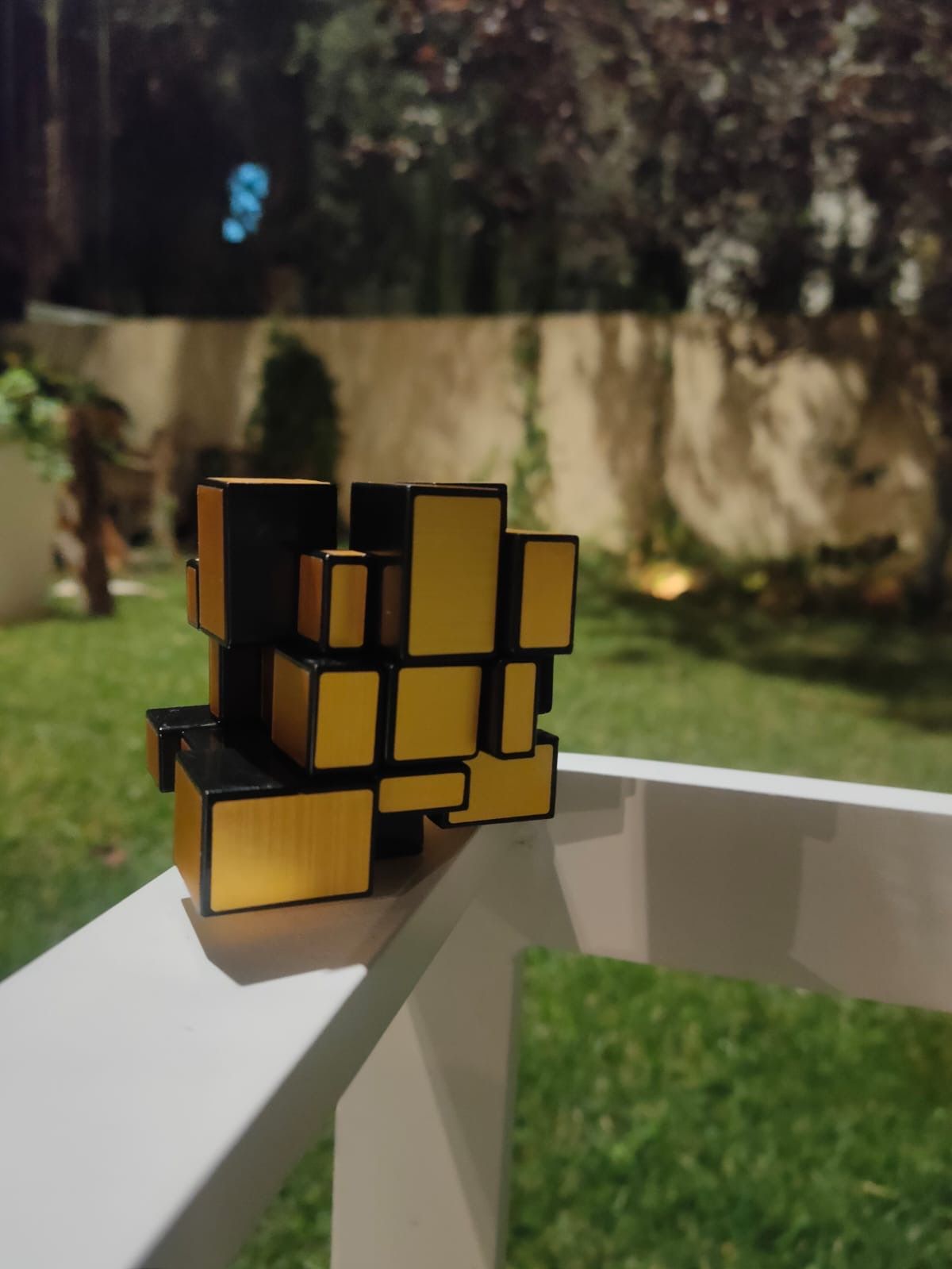 Take the cube in the image and make a complex elegant building in Tel Aviv based on it. Have the building placed in Disingoff street with pe...