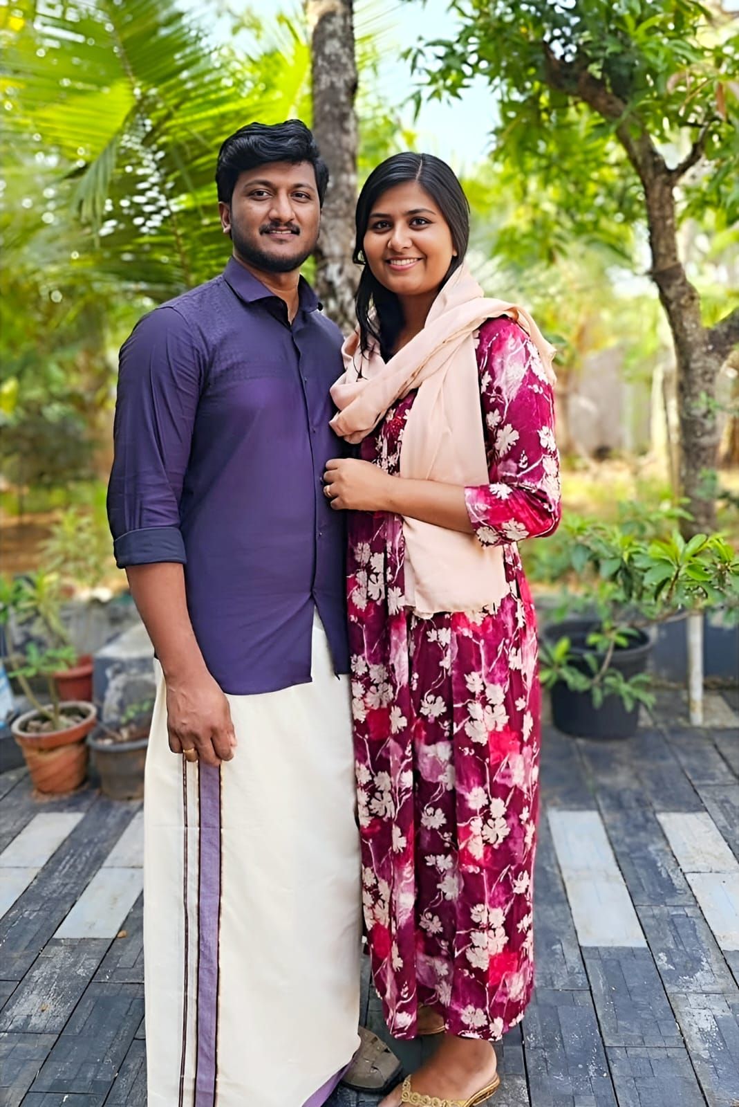 
The delicate chiffon of her saree whispered with every shift of her weight as she leaned over the broad, polished desk. Her focus was on th...