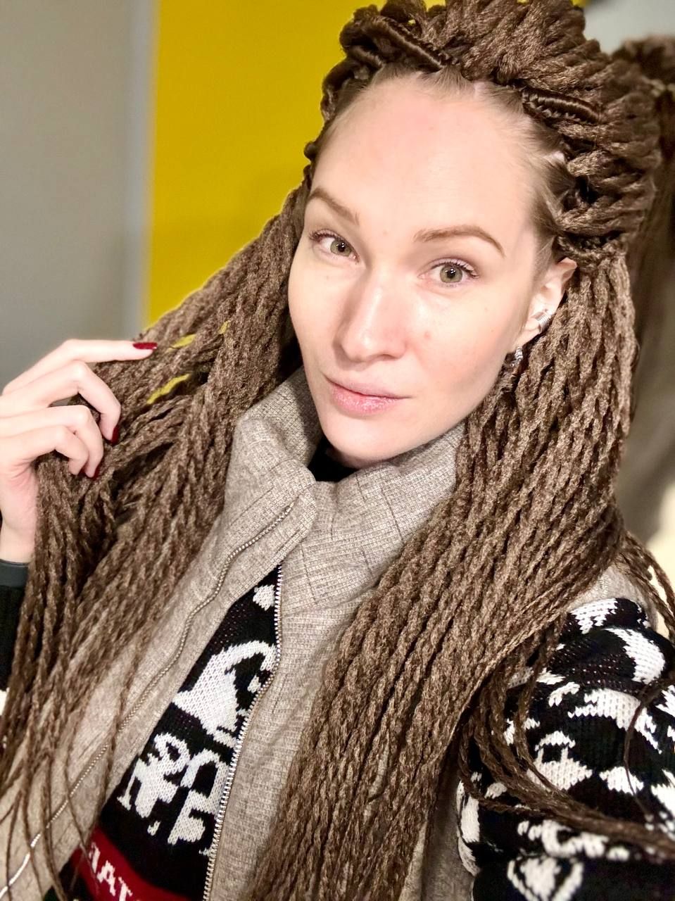 comic art horror of <Subject> as a woman from the game The walking dead, She has a cap on her head and a gun in her hands