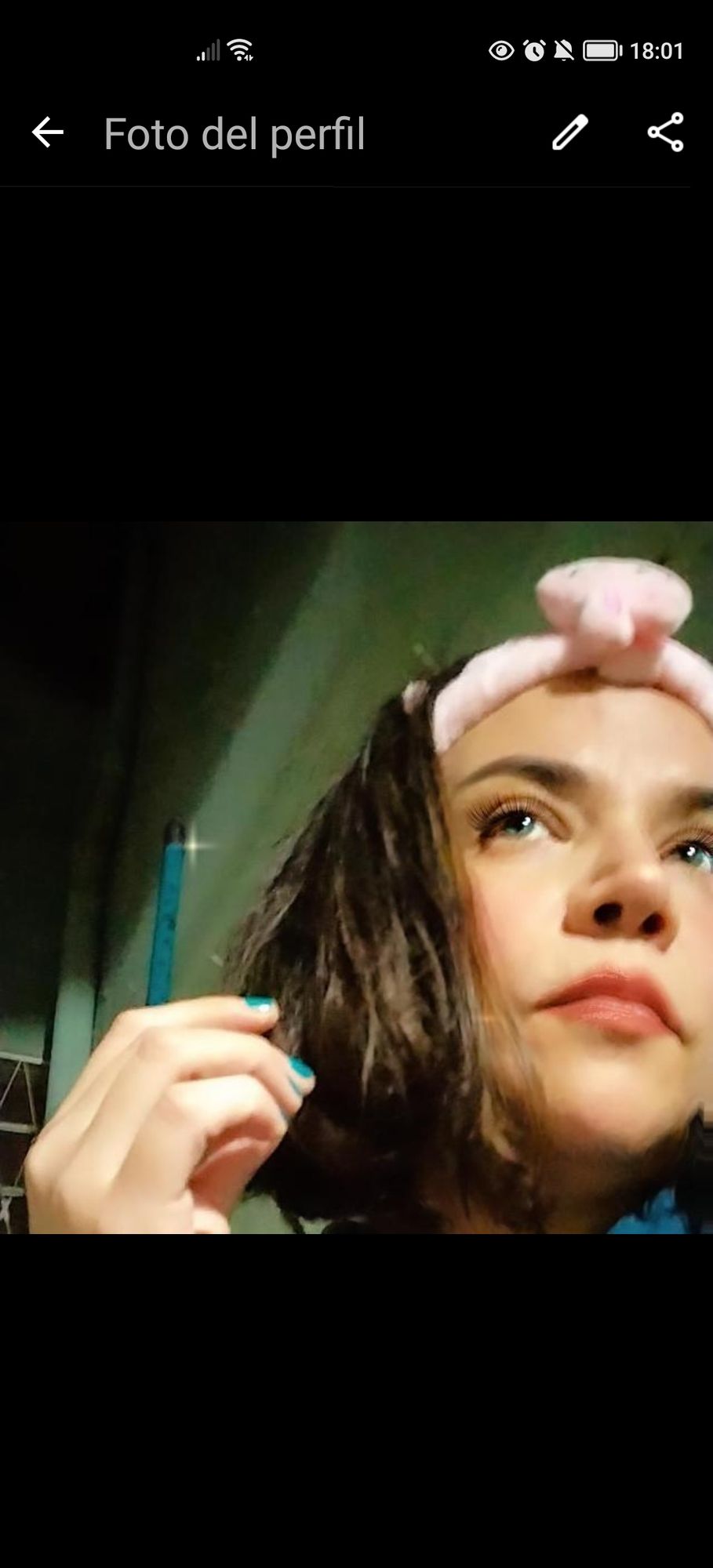 This image shows a serene moment of a woman lost in thought, surrounded by the tranquility of a forest, as the golden hour reflects in her c...