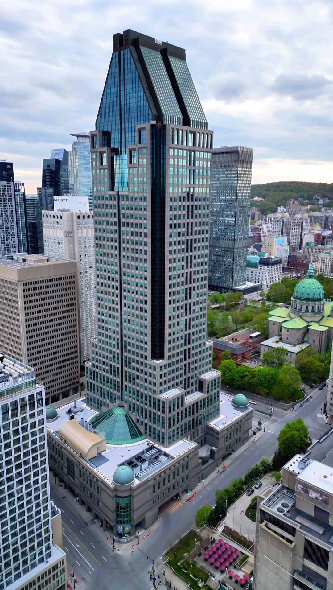 A futuristic dystopian city at night with many flying and hovering futuristic vehicles