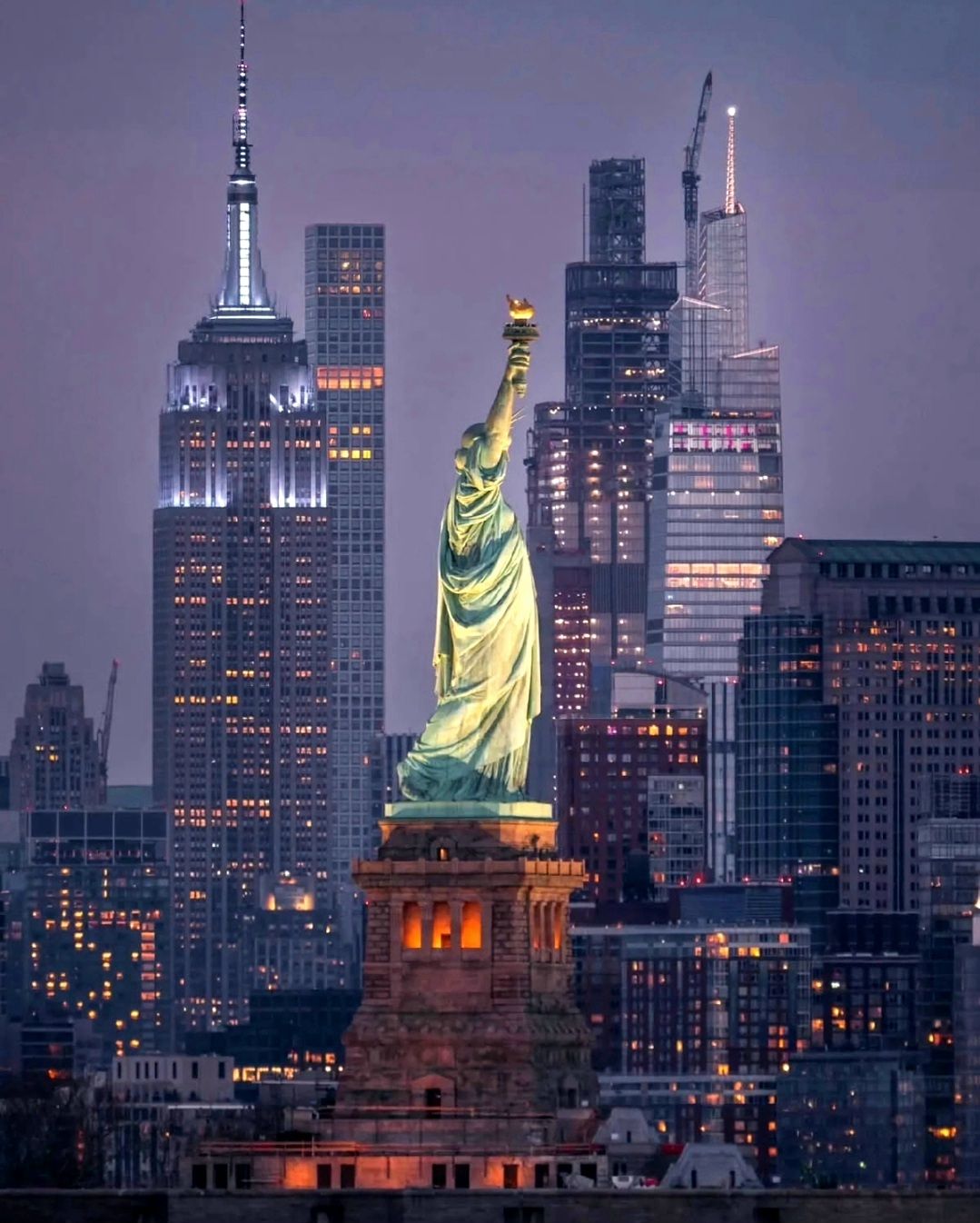  A bustling cyberpunk metropolis at night with towering skyscrapers adorned with holographic advertisements and flying vehicles with neon li...