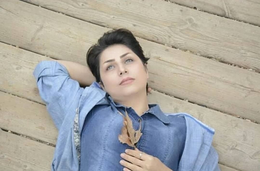 A young woman (with same face as the referenced photo) leaning slightly back with a confident and contemplative expression, not smiling. He ...