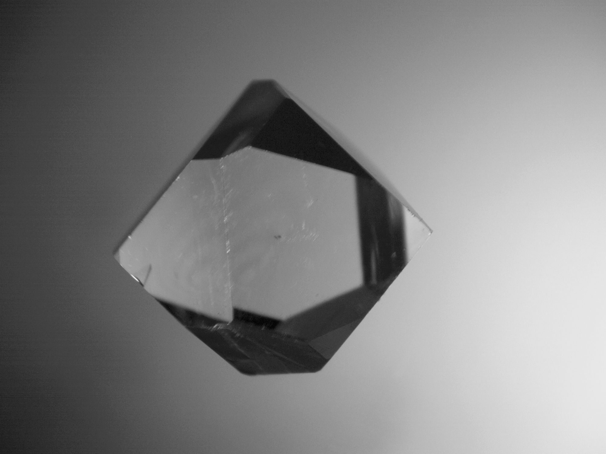 Silver cyborg floating eyes in a sea of mercury