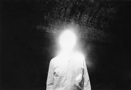 create an image of old astrolabe. antique telescope. goth fashion model. cobwebs. haunted house. ghosts. chains. haunted portraits. ouija bo...