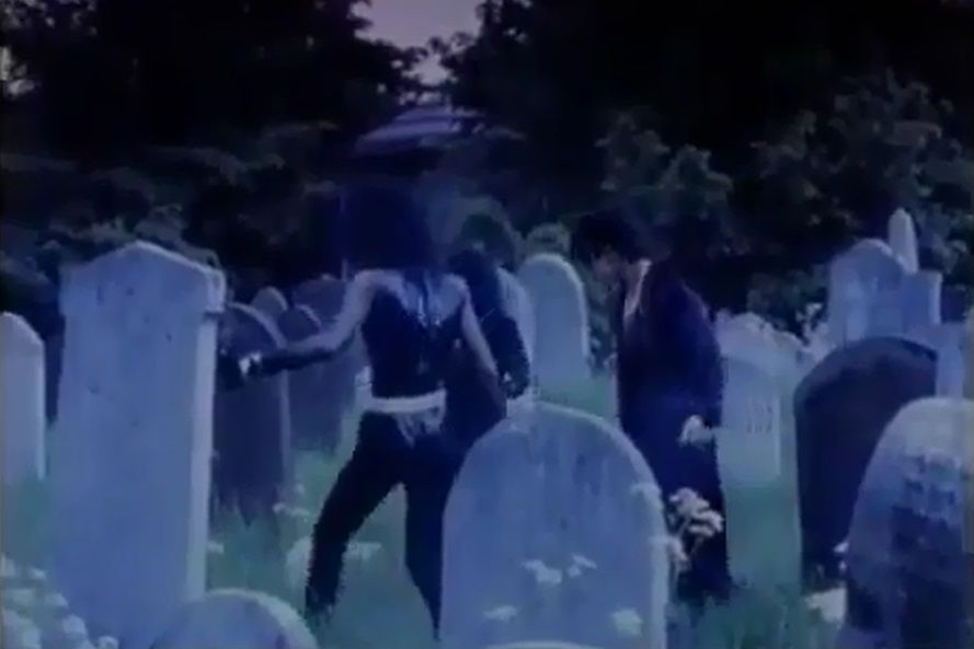 beautiful female goth fashion model. goths in graveyards. goths. tombstones. graveyard. eerie. fog. smoke. female goth metal sculptor fashio...