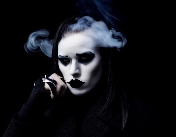 black and white photography. female goth fashion model. goth coffee shop. fog. smoke.