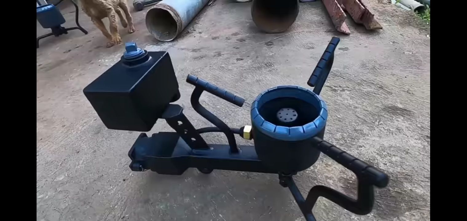 the circular stove on the right should have a golden colored burner on top. the rectangular shape on the left should be bigger and the portr...