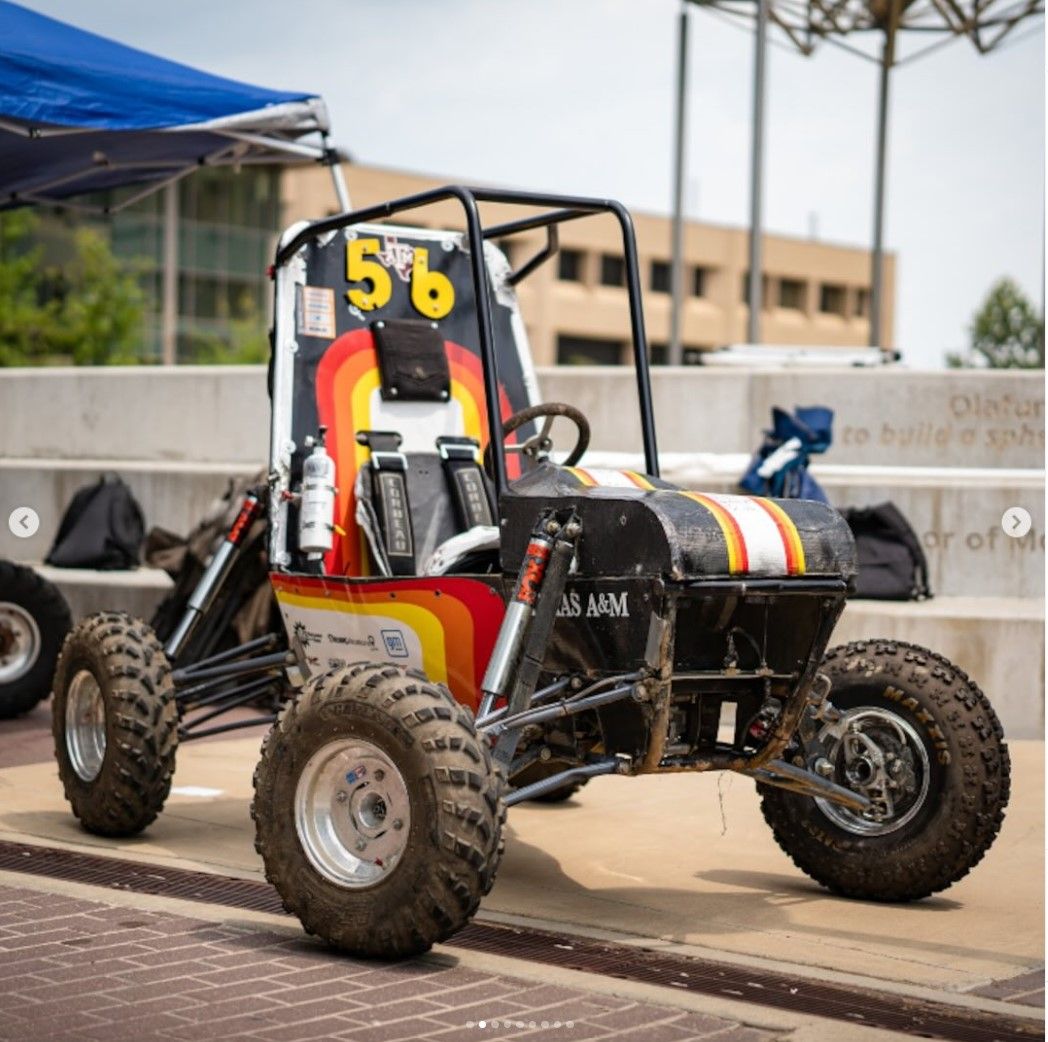 recreate this shirt logo with the number 51 instead of the 35 and replace the motorcycle in the back with the baja car. In terms of text rep... - Start Image 2