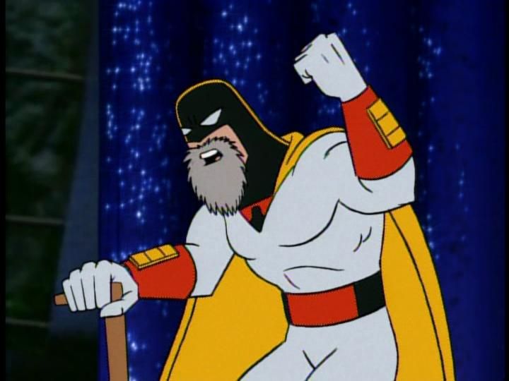 Space Ghost with a long blonde beard in wrestling ring with no cane