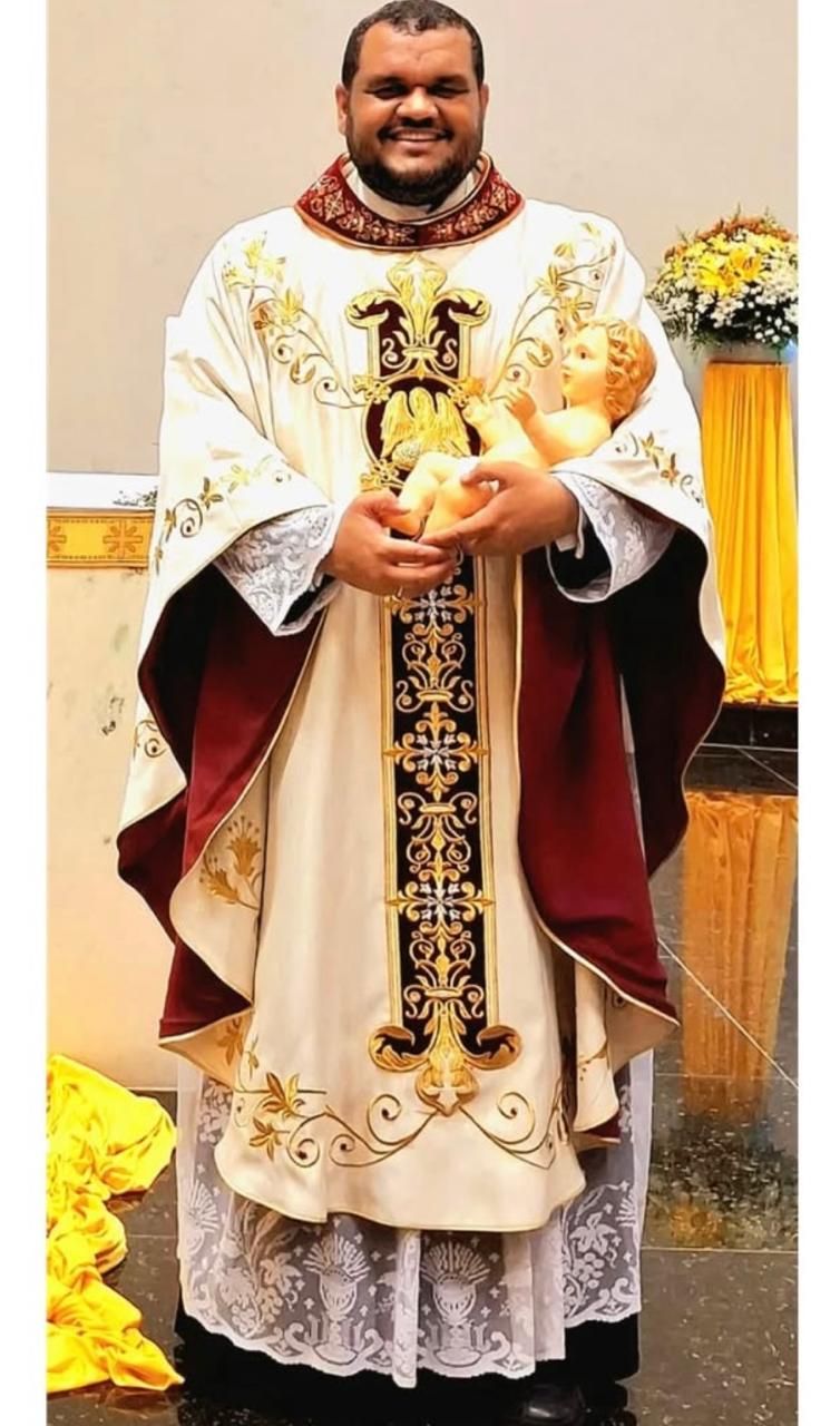 Create a catholic style iconography portrait based on the uploaded image the style, the mimic traditional catholic iconography  art with bol...