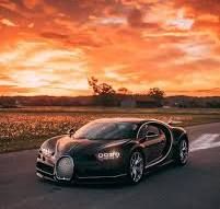 A bugatti in the sunset