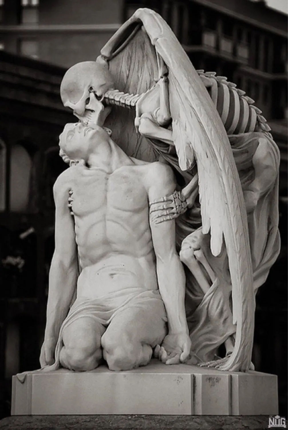 A winged skeleton embraces a man in the Kiss of Death