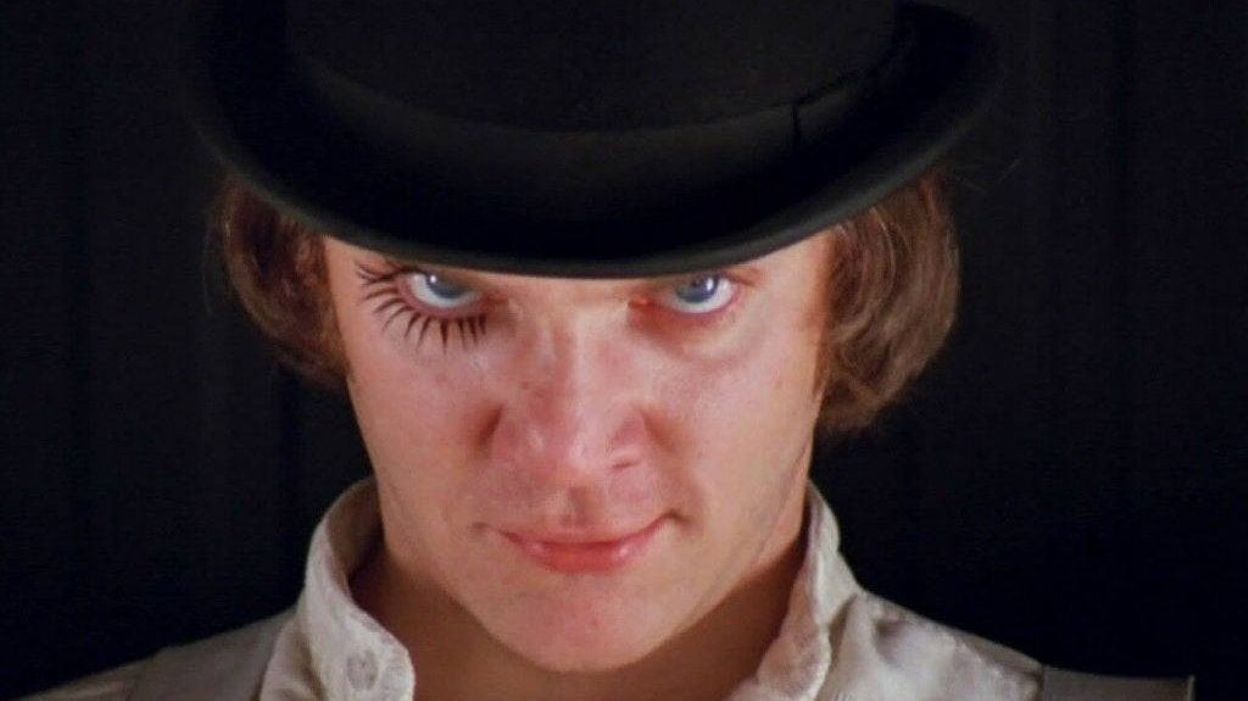 make this face Glasgow smile wide eyes open with one eye kept open by metal as clockwork orange 
 - Start Image 2