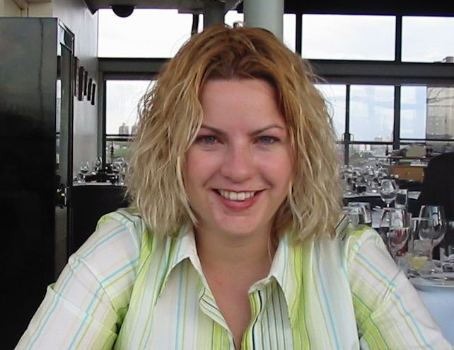 change image to an ai image, add 15 years and some grey to the hair colour

