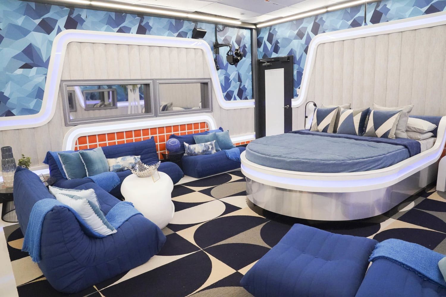 HOH bedroom; outer space theme, chrome furnishings with black and green fabrics as if the Bedroom is in a UFO 