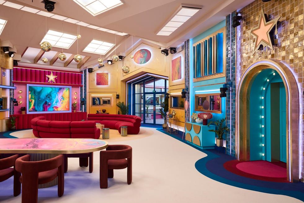 Hyper Realistic Highly immersive decorated Art Deco Hollywood 
Common Room  with a Film Theel Oscar Aesthetic, Gold and film reels giving an...