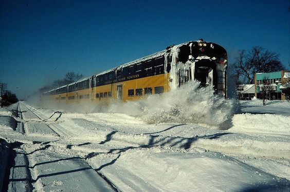 Train powerfully forces its way through the snow