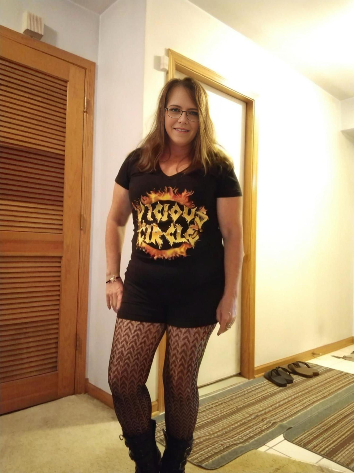 "Now that is the body of a real american woman"

Caucasian woman, appears to be in her 50s, poses casually, indoors. She...