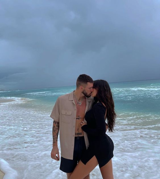 A secret, sensual, passionate, clandestine kissing on the beach