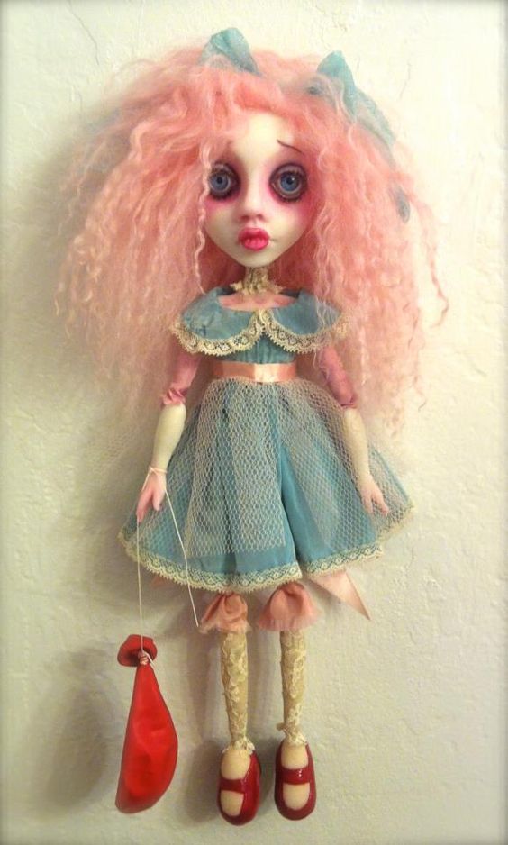 Gothic doll with pink hair, with a very sad face in a very gothic environment full of color and mystery.