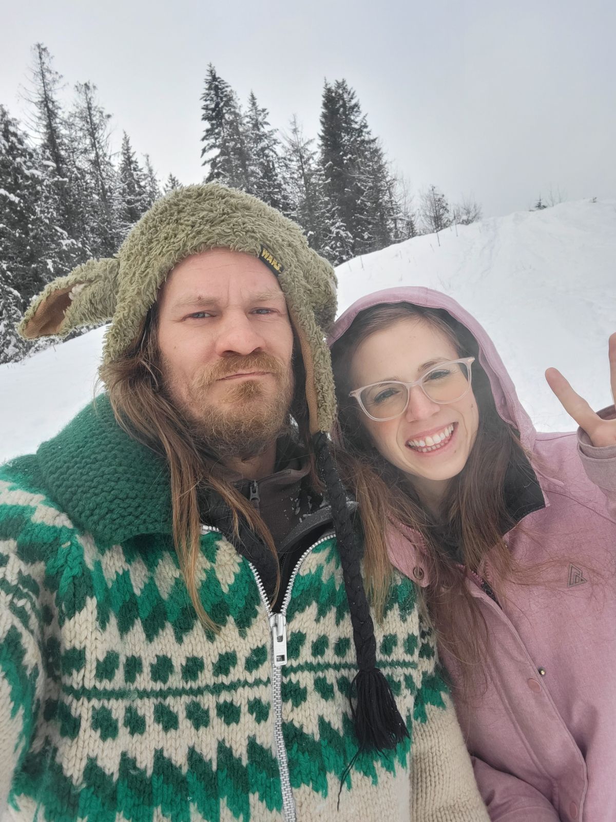 The Emerald Queen and the mature blonde long-haired King are glowing in love during winter while sitting at a rainbow feast table with rose...