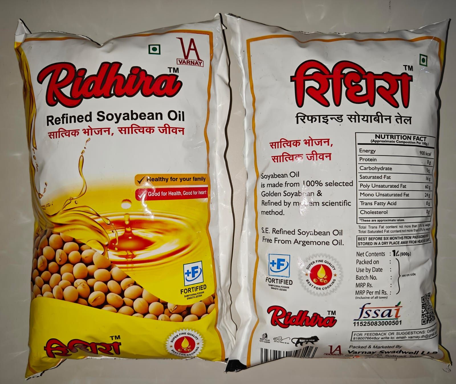 "Create a premium, eye-catching ad using the uploaded Ridhira Refined Soyabean Oil packet photo. Keep the packet as it is, with a glowing go...