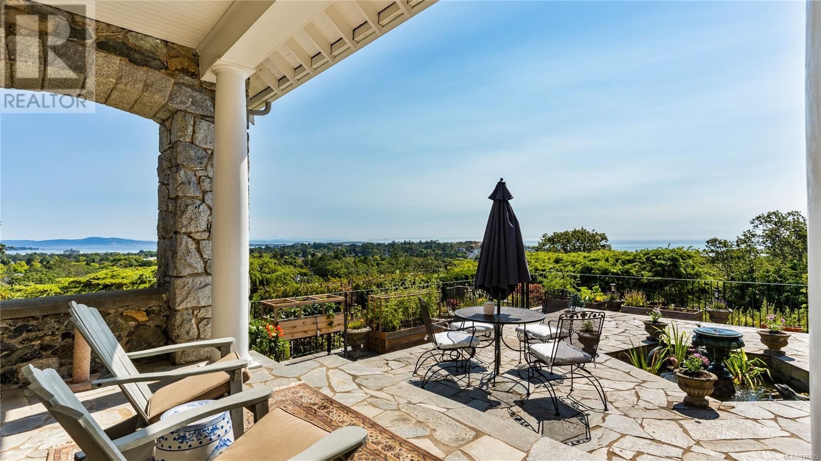 The entrance gave way to a hall and directly in front of me was a high-ceilinged rectangular room with umber walls with two sets of wide, pa...