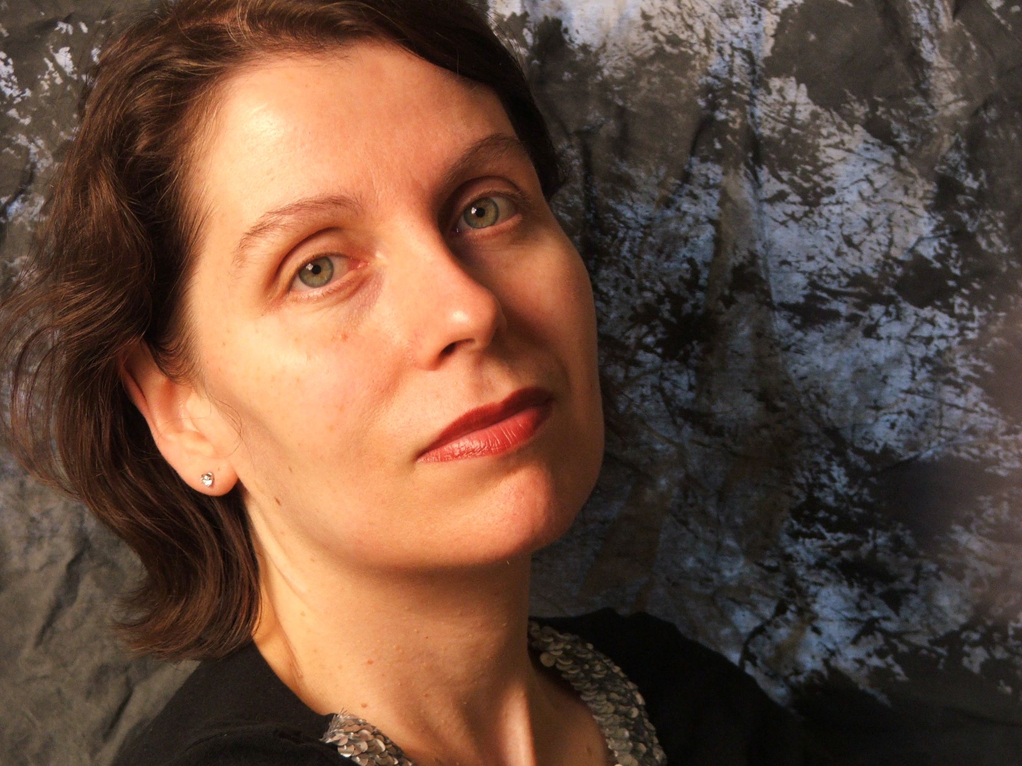 a brunette medieval noble woman in armor