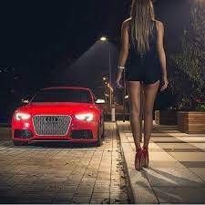 the cinematographic pictures of a young black woman mixed race, beside a sport car, on a miami beach during the 80s, by night, tatoos, jewel...