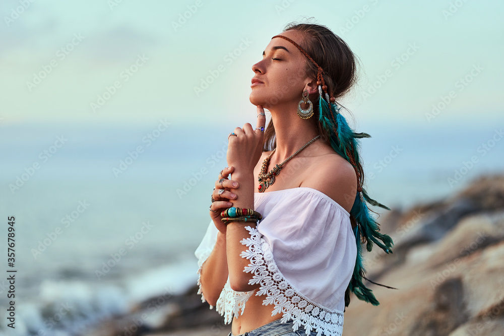 A captivating cinematic still of a stunning, muscular Arabian woman dressed as an assassin, long veils with intricate patterns, standing bol...