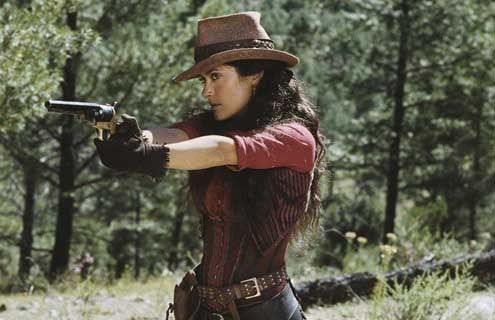 the cinematic pictures of a steampunk lady shooting with a gun, Cinematic film still, shot on v-raptor XL, film grain, vignette, color grade...