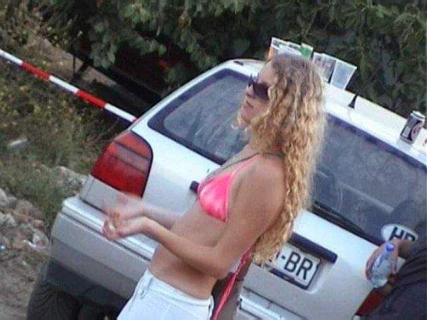 a woman dressed as a clown with red hair, in the style of magical girl, colorful moebius, light yellow and dark crimson, pencilsteampunk, k...